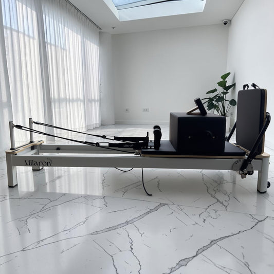 Milaron Pearl Studio reformer with a 6063-T5 aluminium frame in Original upholstery.